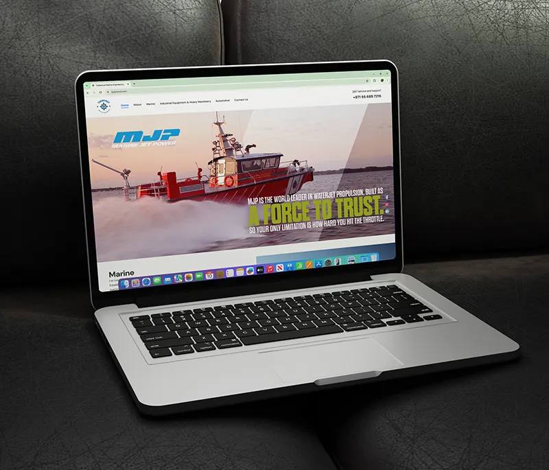 showing the website of a turbomot on a laptop created by the best branding agency in calicut