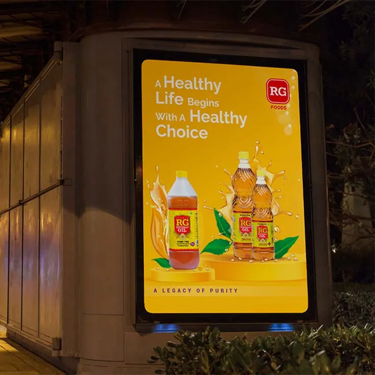 A screen on a wall showing a business brochure of RG Foods